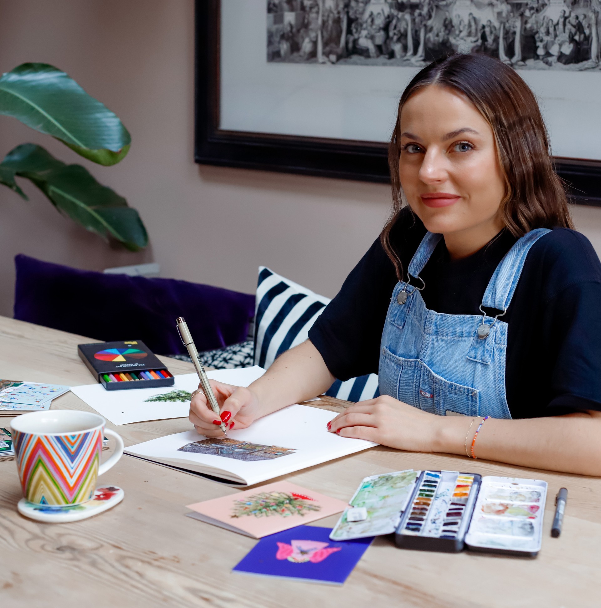 Architectural illustrator, Nushy, at her desk