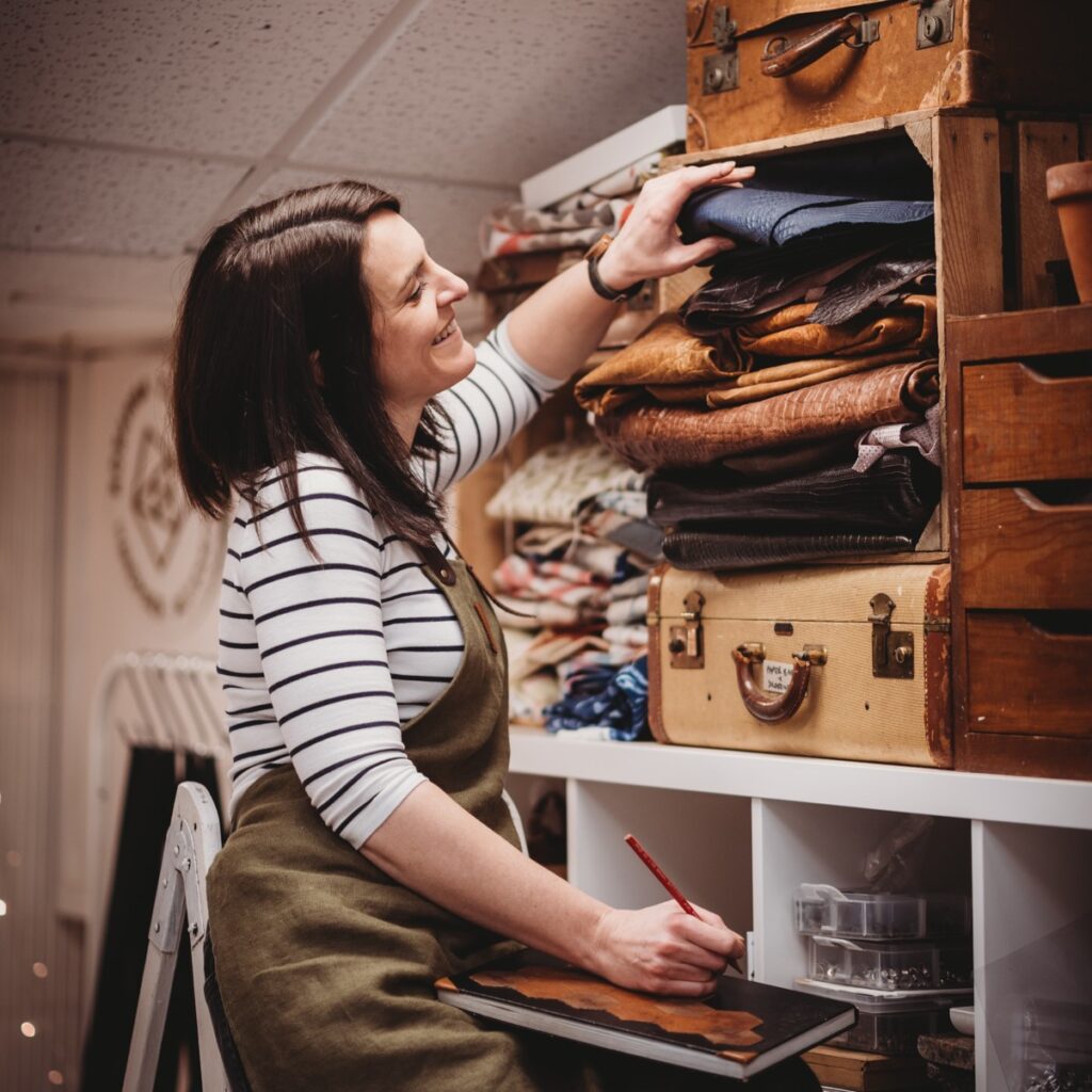 Rosanna Clare choosing leather in her studio