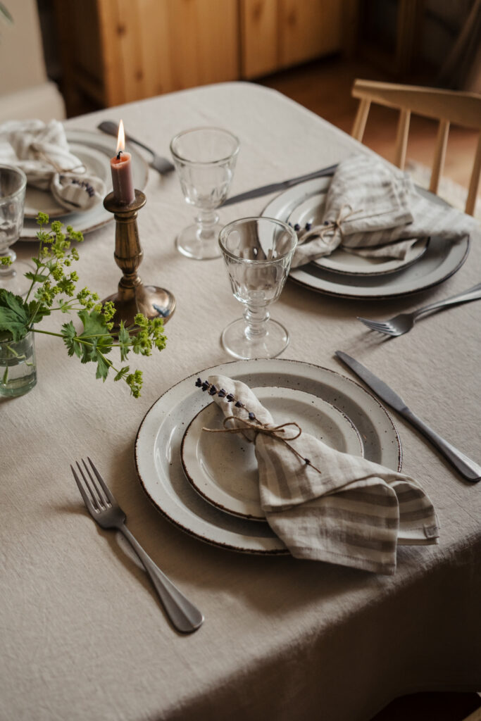 A beautiful table setting featuring napkins by Charlotte from Cloth & Clay