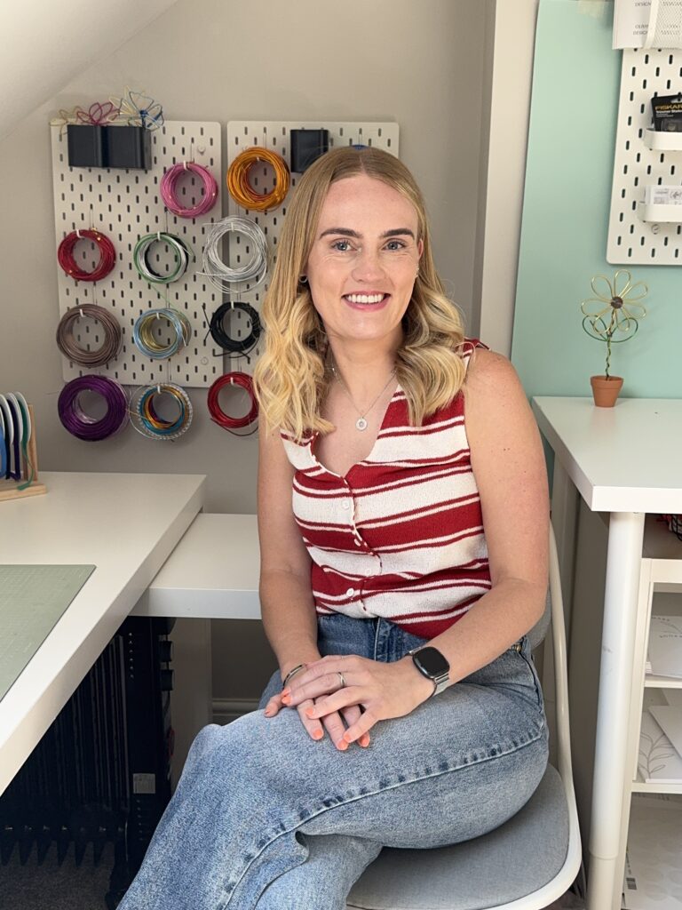 Carly from Olivin Designs in her wire-art studio