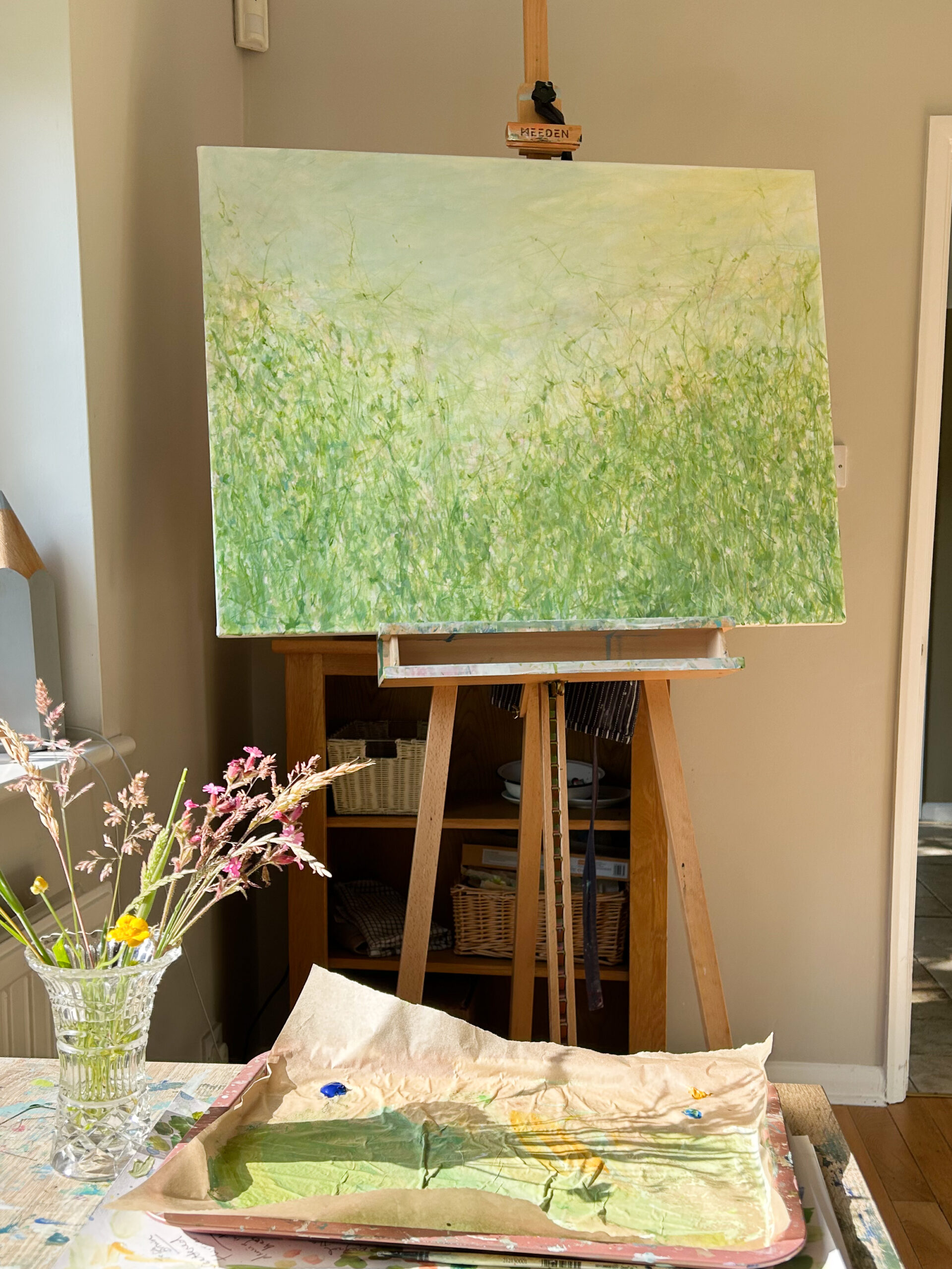 Original painting by Charlotte Riley Art, on an easel in her studio