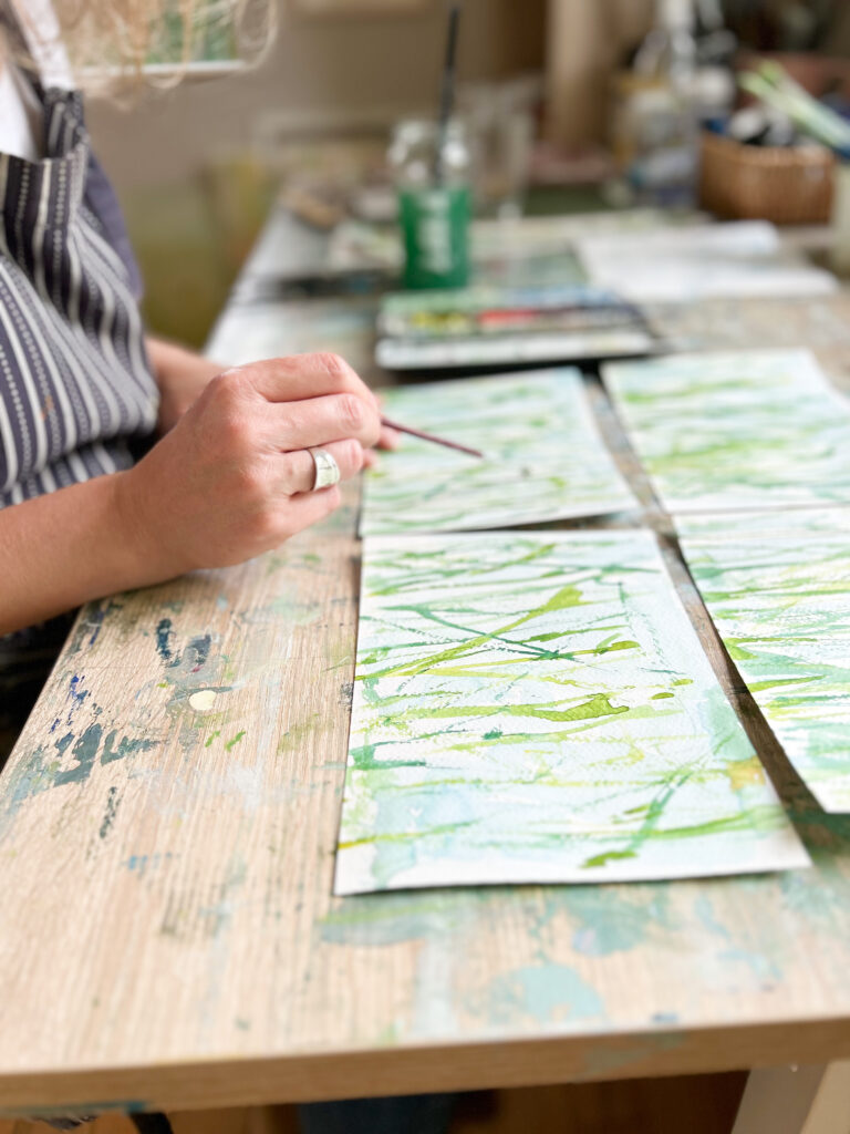 Charlotte Riley Art's hands, painting, working on some watercolour studies