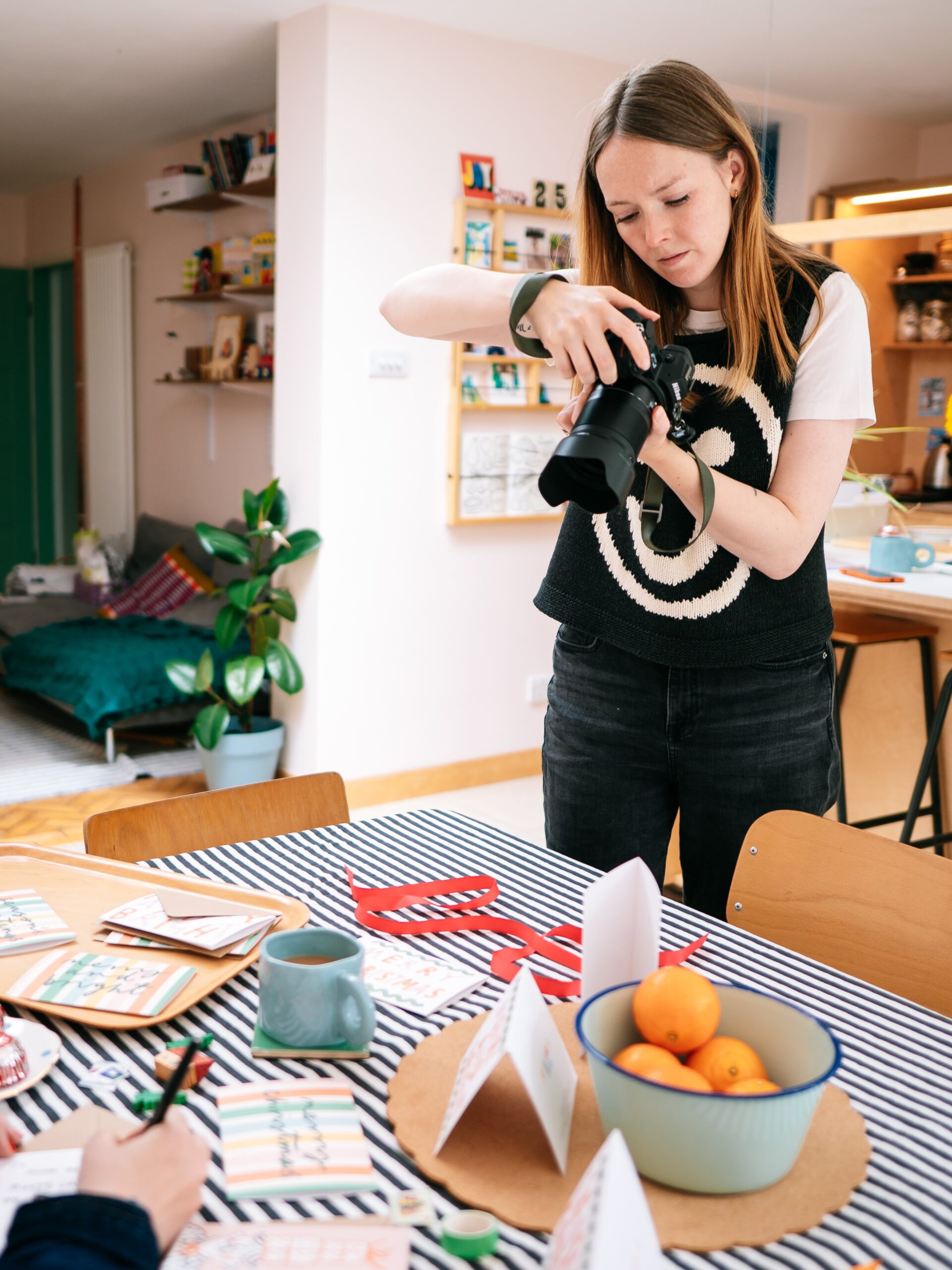 Holly from Holly Booth Studio, photographing a brand at work