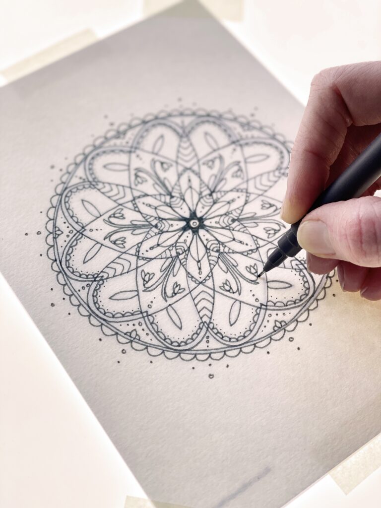 For Creatives' Sake Year of mindful mandala pattern templates, January design, being traced onto watercolour paper