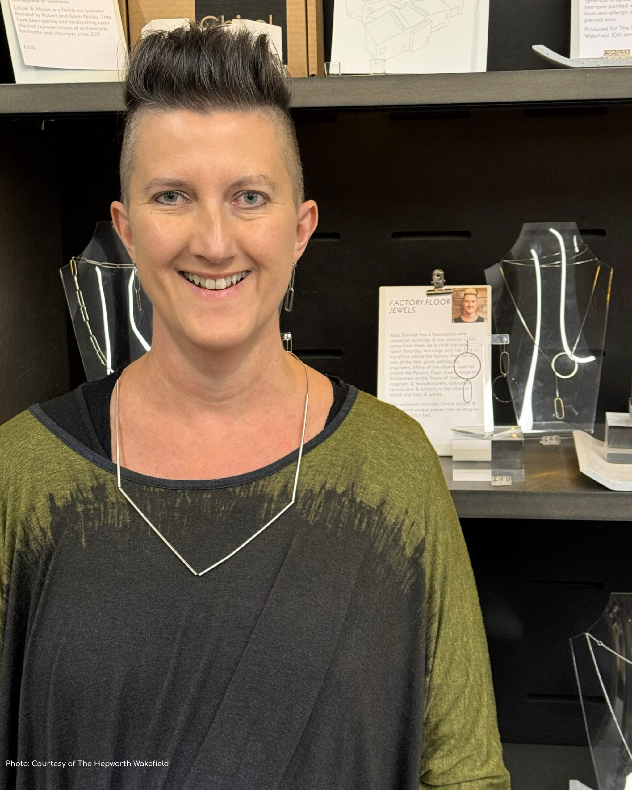 Kate from Factory Floor Jewels at The Hepworth Shop, with her jewellery behind her