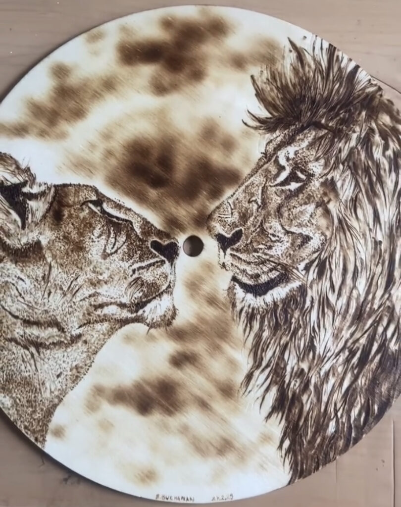 Pyrography lion portrait by Elaine Buchanan Art